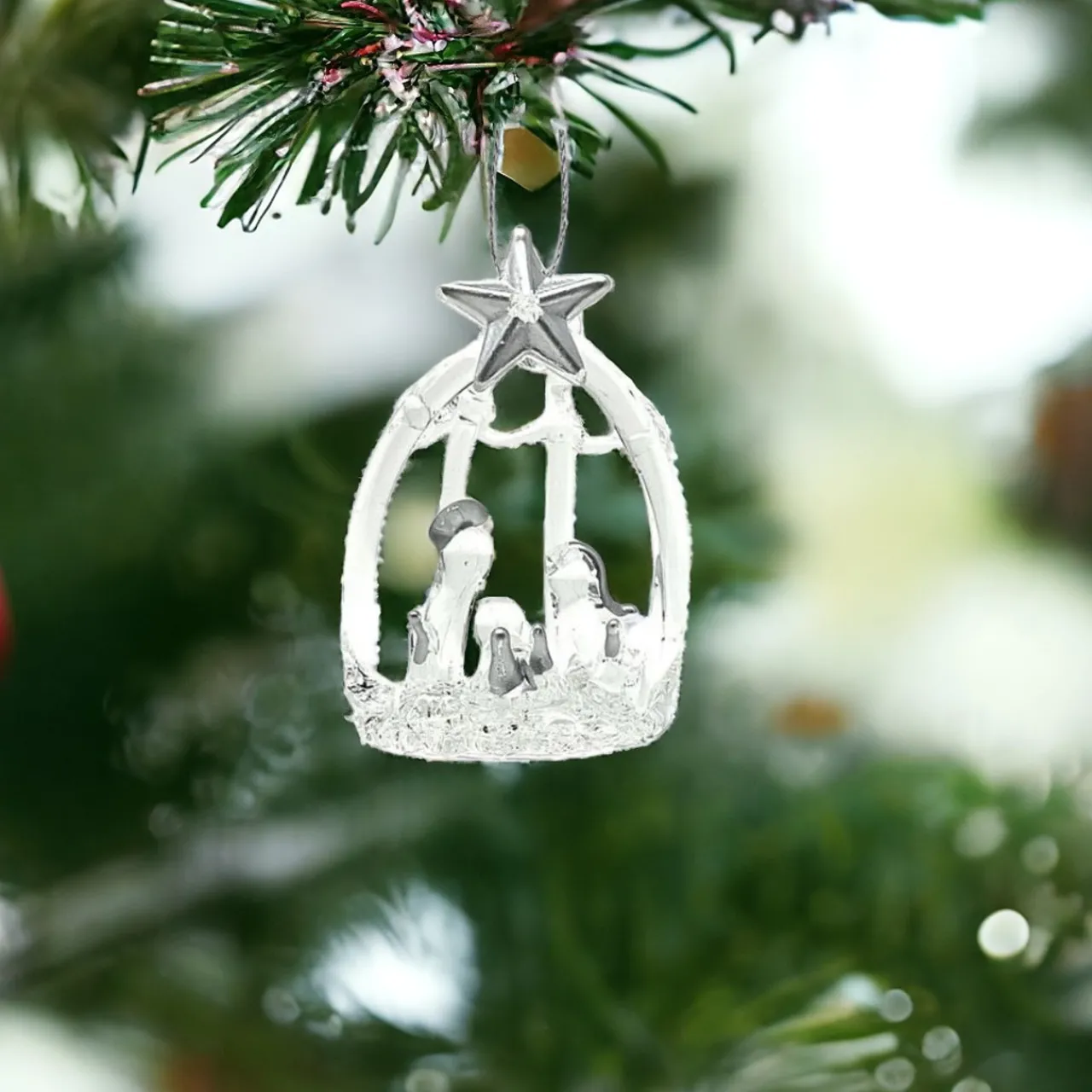 Blessed Nativity Ornament with Silver Star< New