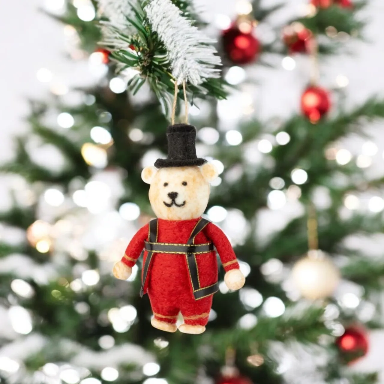 Felt King’s Guard Bear Ornament in Red Sweater< Hot