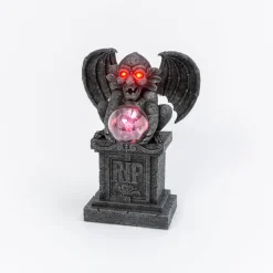 Gargoyle With Plasma Globe Perched On A Gravestone< New