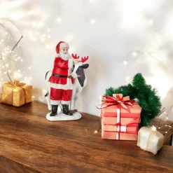 Resin Santa with Cow Figurine< Clearance